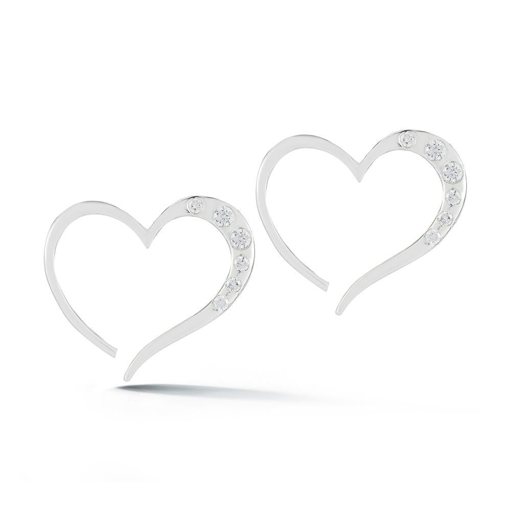 Designed in NYC

.925 Sterling Silver Black Sapphire Open Heart Pavé Stud Earrings. On the road to charting your own path, the only rule is to follow your heart. Open heart pavé stud earrings:

Sterling silver 
High-polish finish
Light-weight 
20 mm