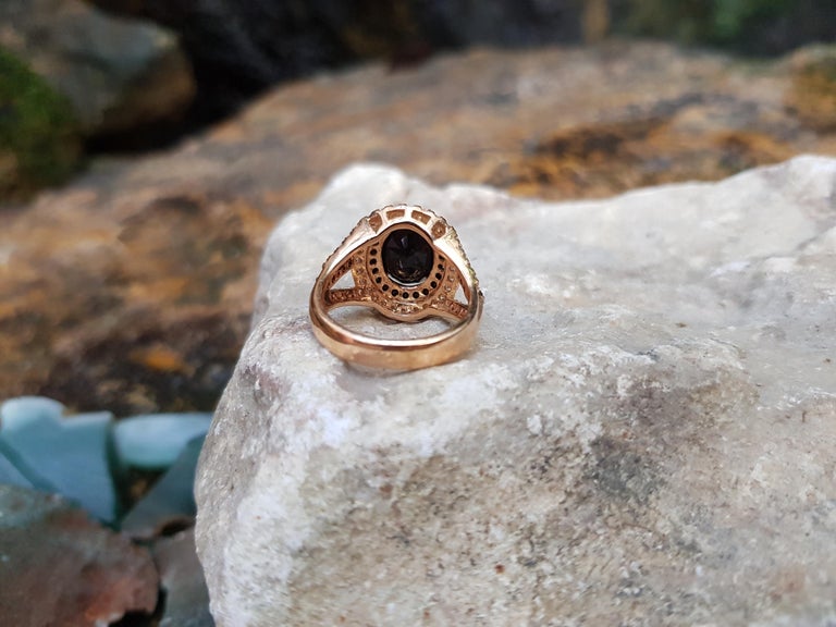 Oval Cut Black Sapphire with Black Diamond and Diamond Rings Set in 18 Karat Rose Gold For Sale