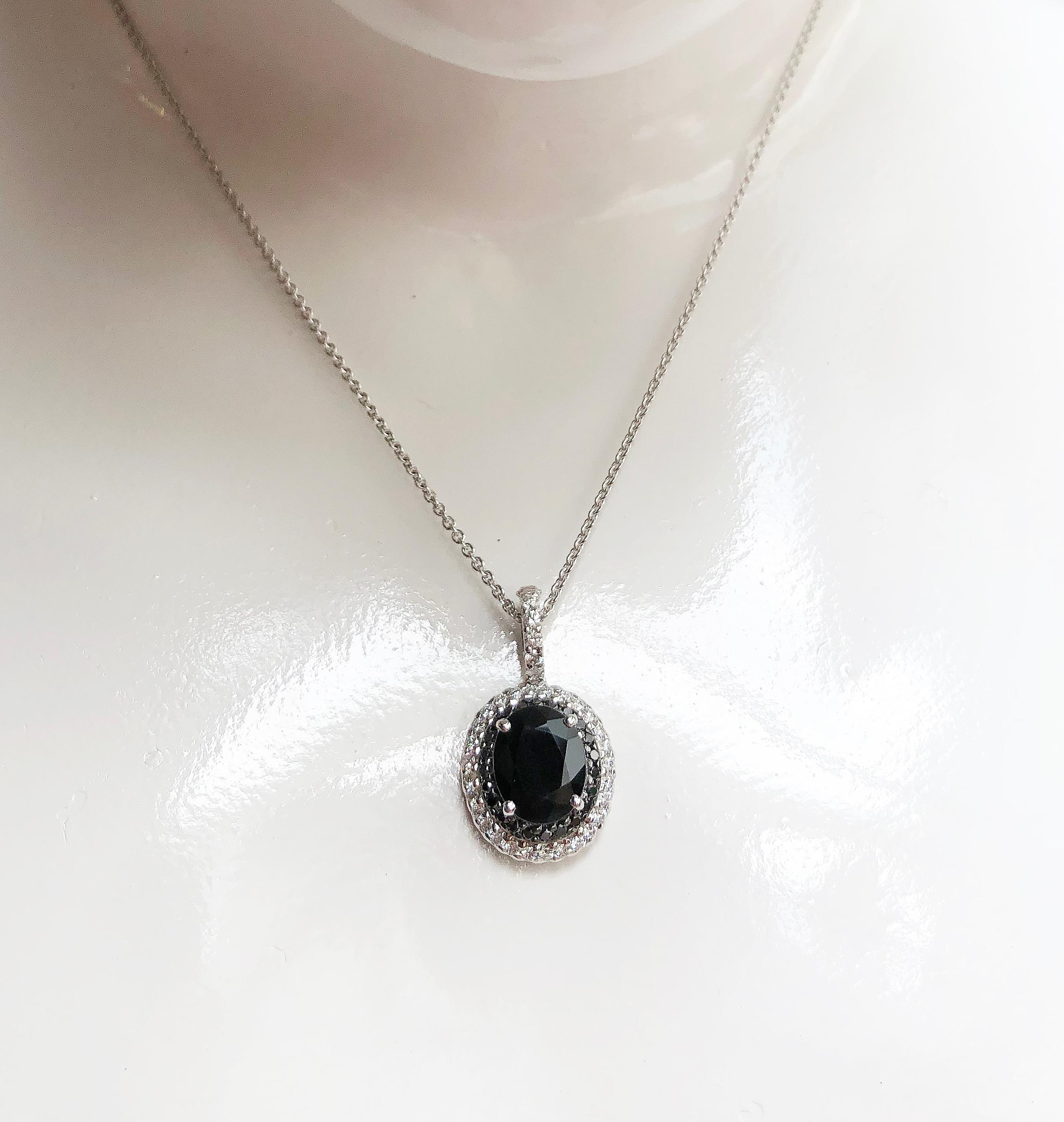 Black Sapphire 4.98 carats with Diamond 0.51 carats and Black Diamond 0.29 carats Pendant set in 18 Karat White Gold Settings
(chain not included)

Width: 1.6 cm
Length: 2.6 cm 


