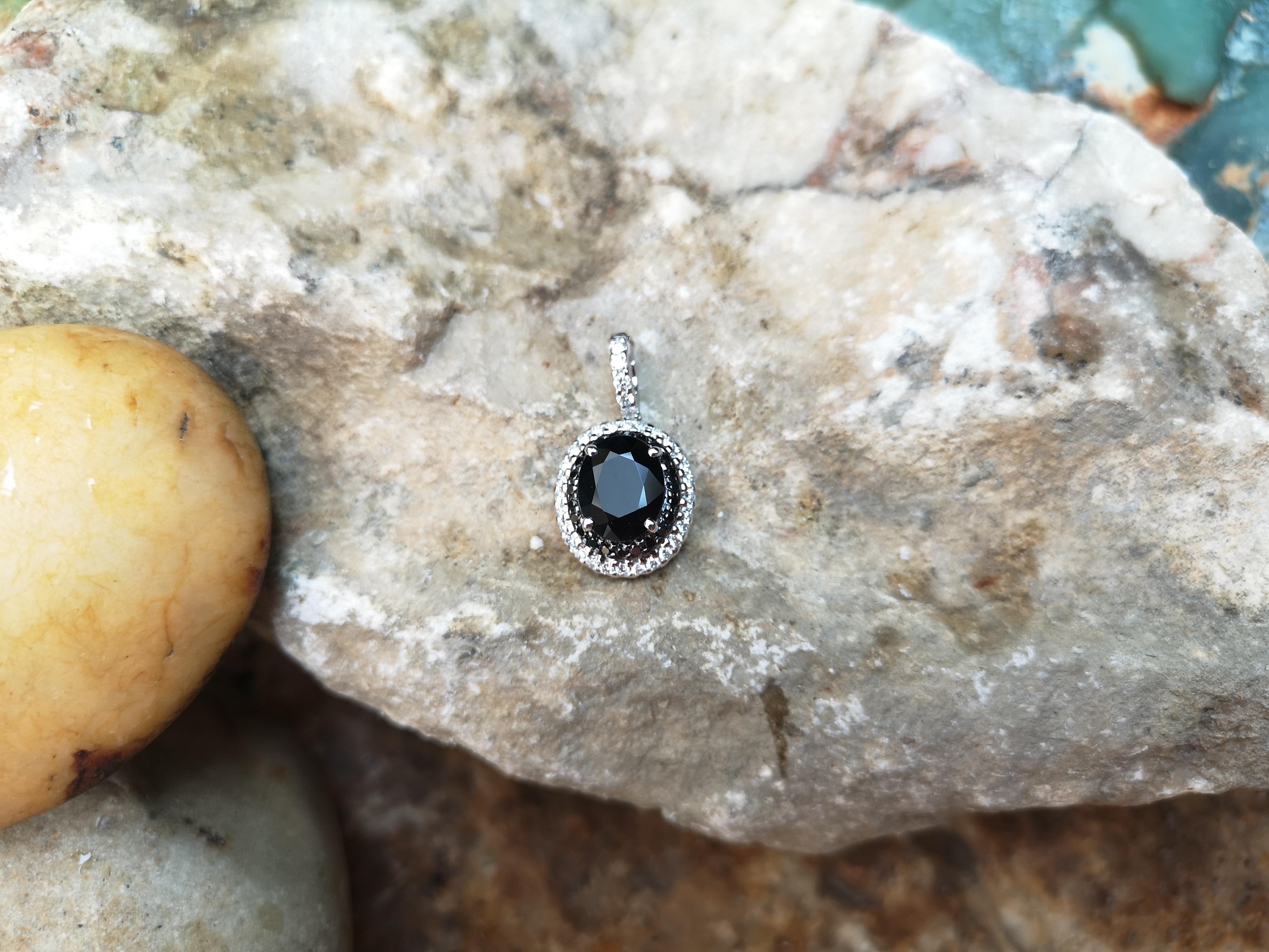 Oval Cut Black Sapphire with Diamond and Black Diamond Pendant Set in 18 Karat White Gold For Sale