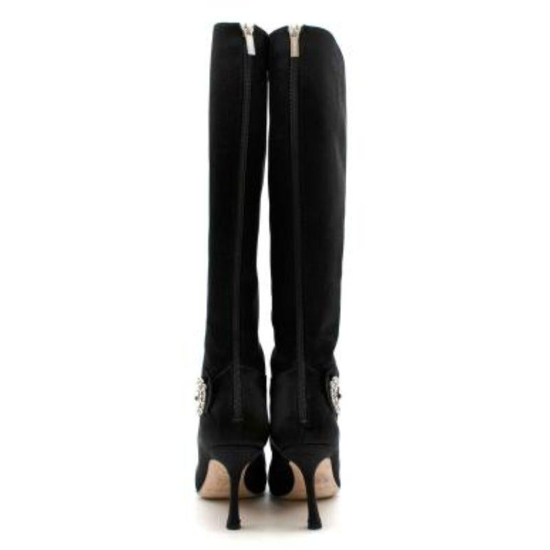 black boots with gold zipper up the back