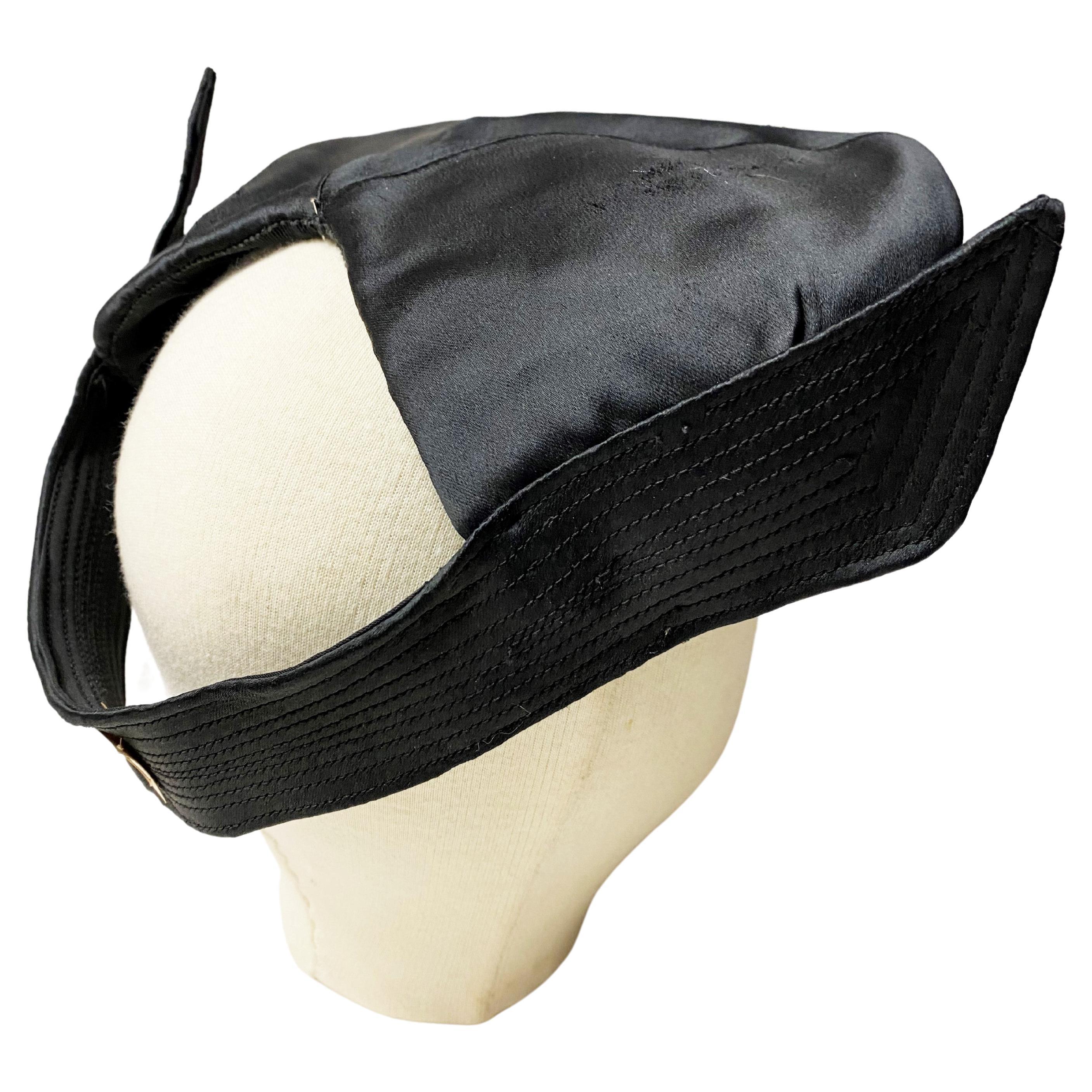 Black satin lady's beret with stitched wings Circa 1945