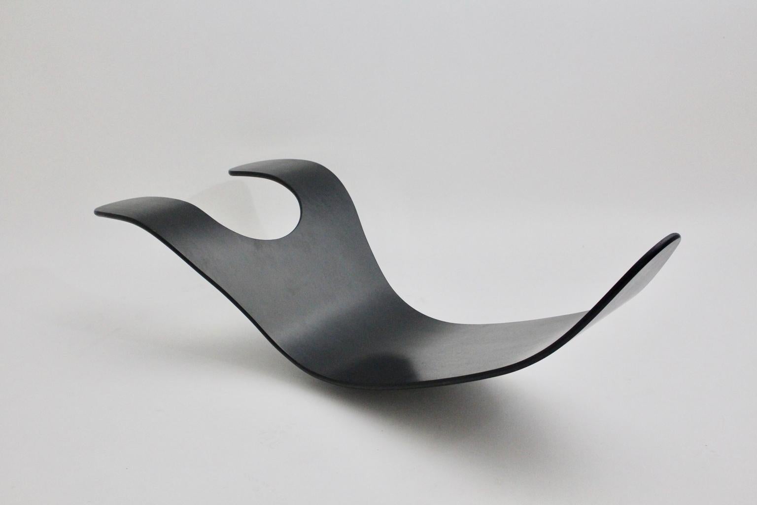 Scandinavian Modern black rocking chair or lounge chair model Chip designed by Teppo Asikainen & Ikka Terho 1995 in Finland and executed by snowcrash ( founded 1998 in Helsinki, Finland ).
The lounge chair 