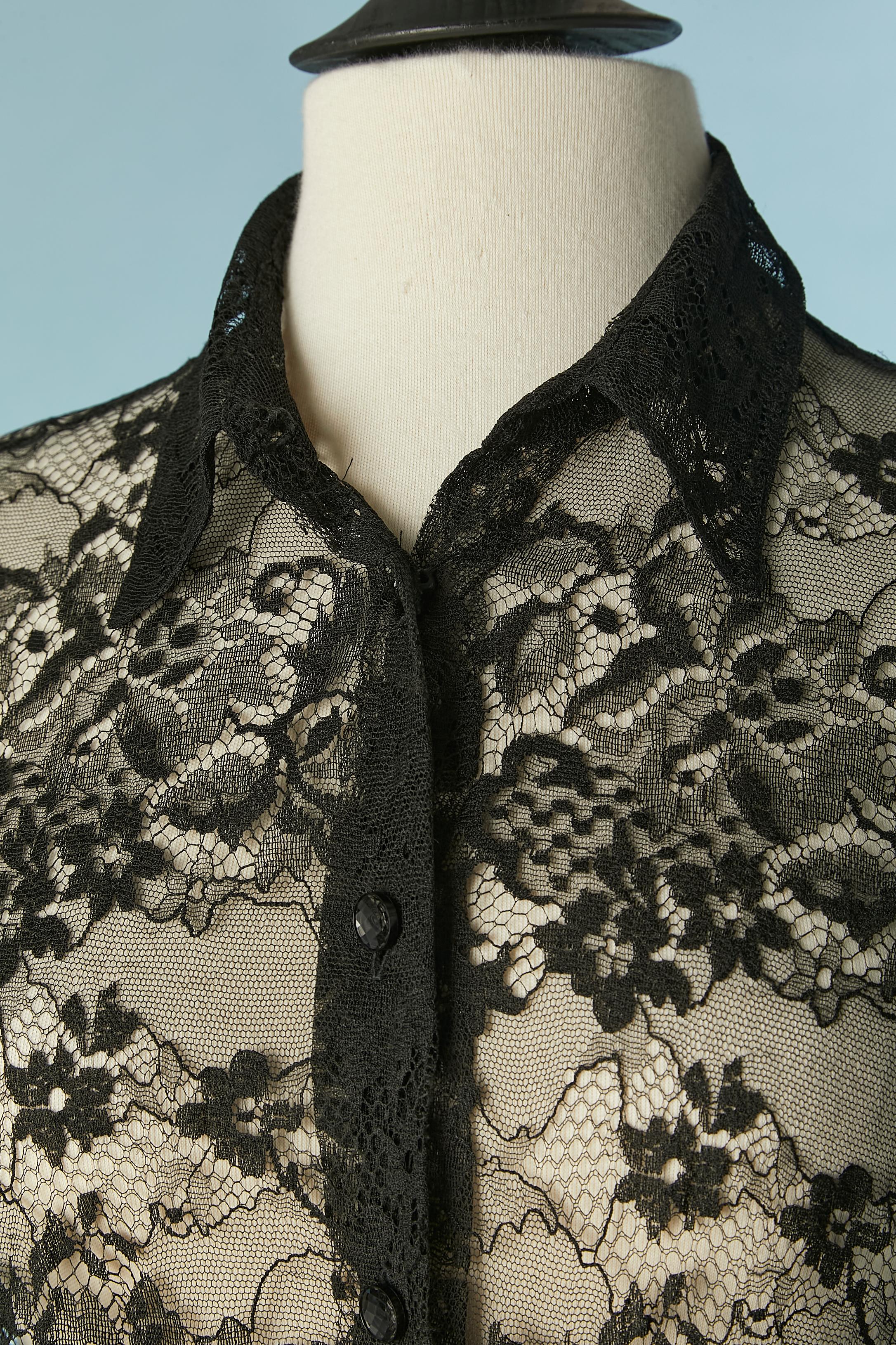 Black see-through lace shirt . Black button closure on the middle front and on the cuffs. 
SIZE 44 (It) 40(Fr) L 