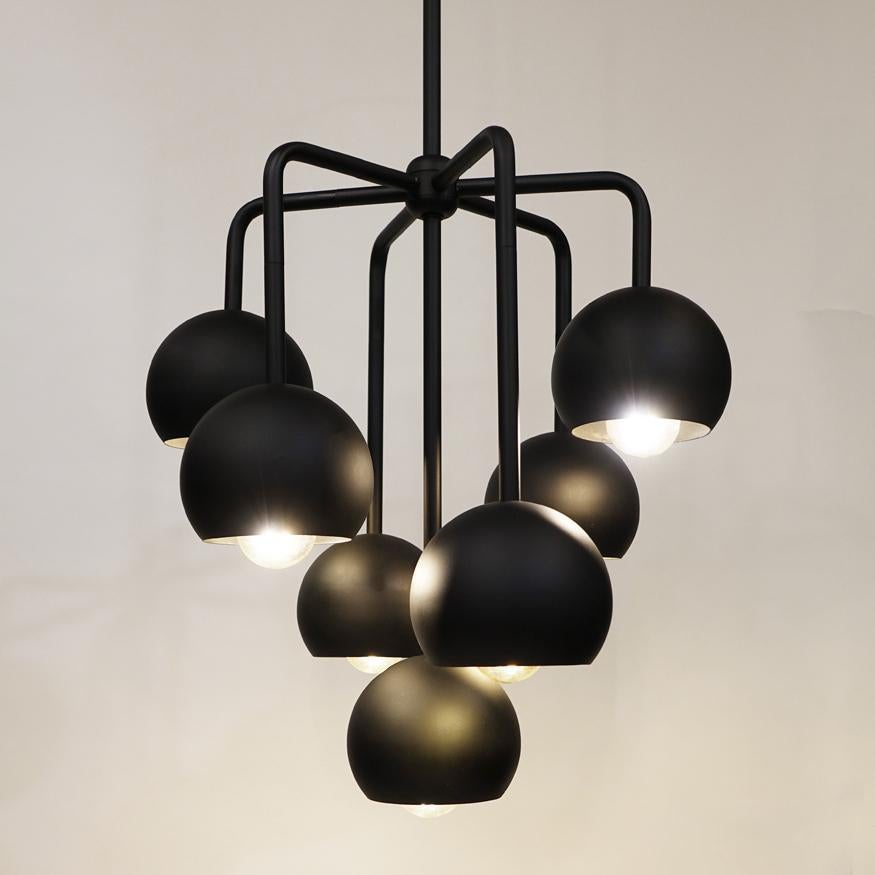 A dramatic, modern pendant light to illuminate your dining room, living room, kitchen. 
Designed by Michele Varian
Powder coated Black Metal
Overall product dimensions: 17 inches L x 17 inches W x 18 inches H
Minimum hanging length: 21
