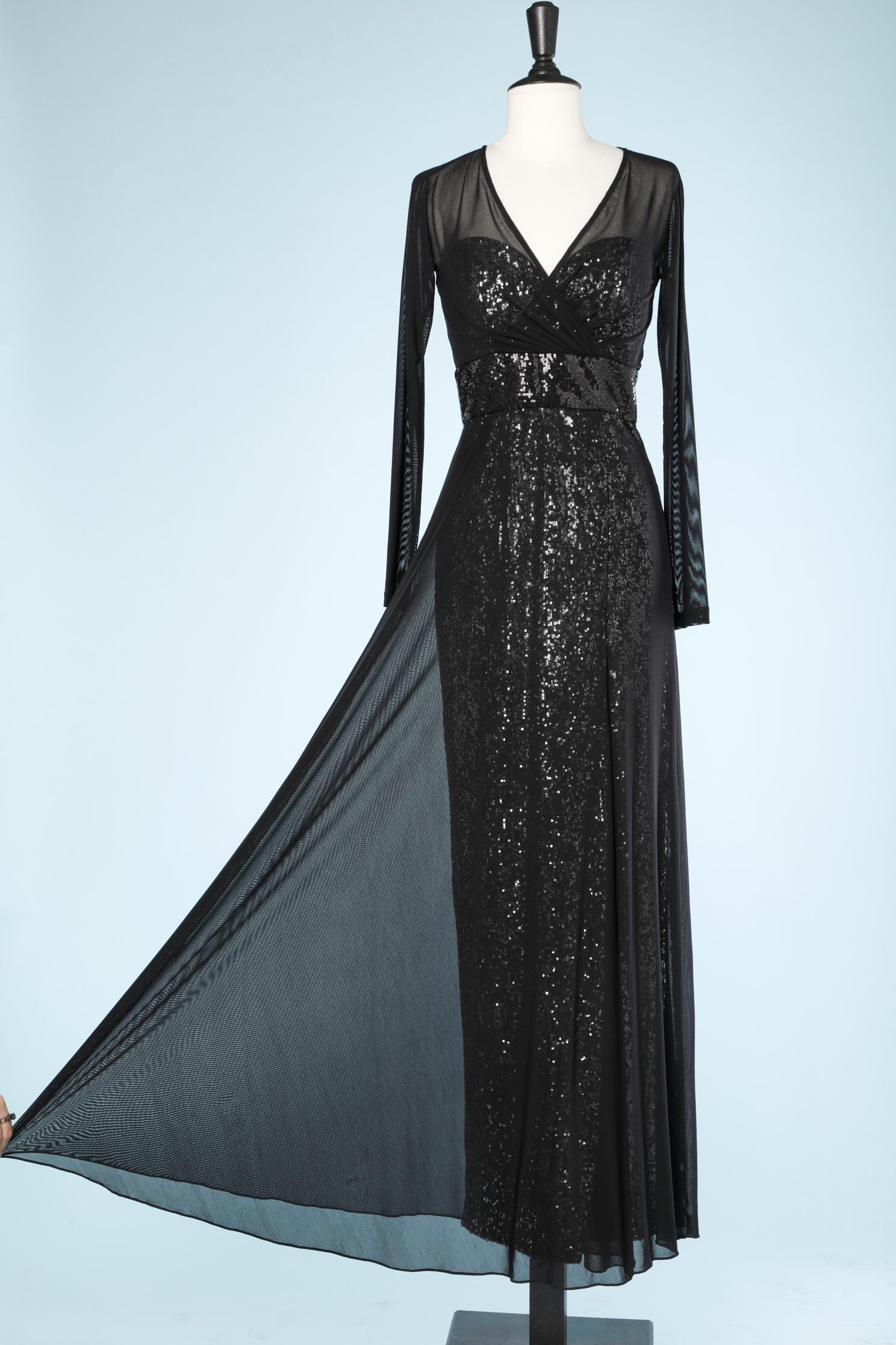 Black tulle and sequin evening dress. Shell composition: 90% nylon, 10% spandex. Acetate lining. 
Thin padded bra. Boned. Invisible zip and hook&eye closure on the middle back. 
Split on the front 
SIZE : M 