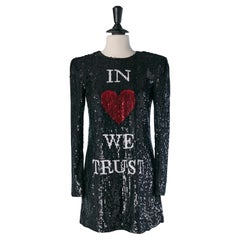 Black sequin cocktail dress " In Love we trust " MOSCHINO COUTURE Black sequin cocktail dress " In Love we trust " MOSCHINO COUTURE