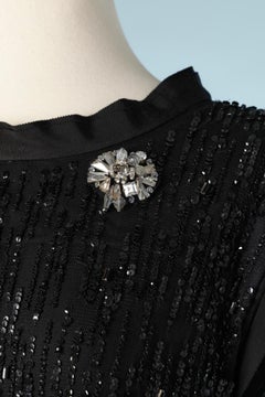 Black sequin dress on a tulle base and rhinestone brooches Lanvin by Alber Elbaz