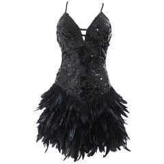 Black sequins and feathers dress
