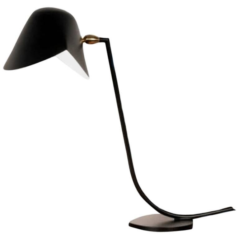 Unique for the Antony Desk lamp, Serge Mouille designed a sloping arm with an angled top attaching to the shade. All atop a round base.

Brass swivel connects the shade. 

FEATURES

