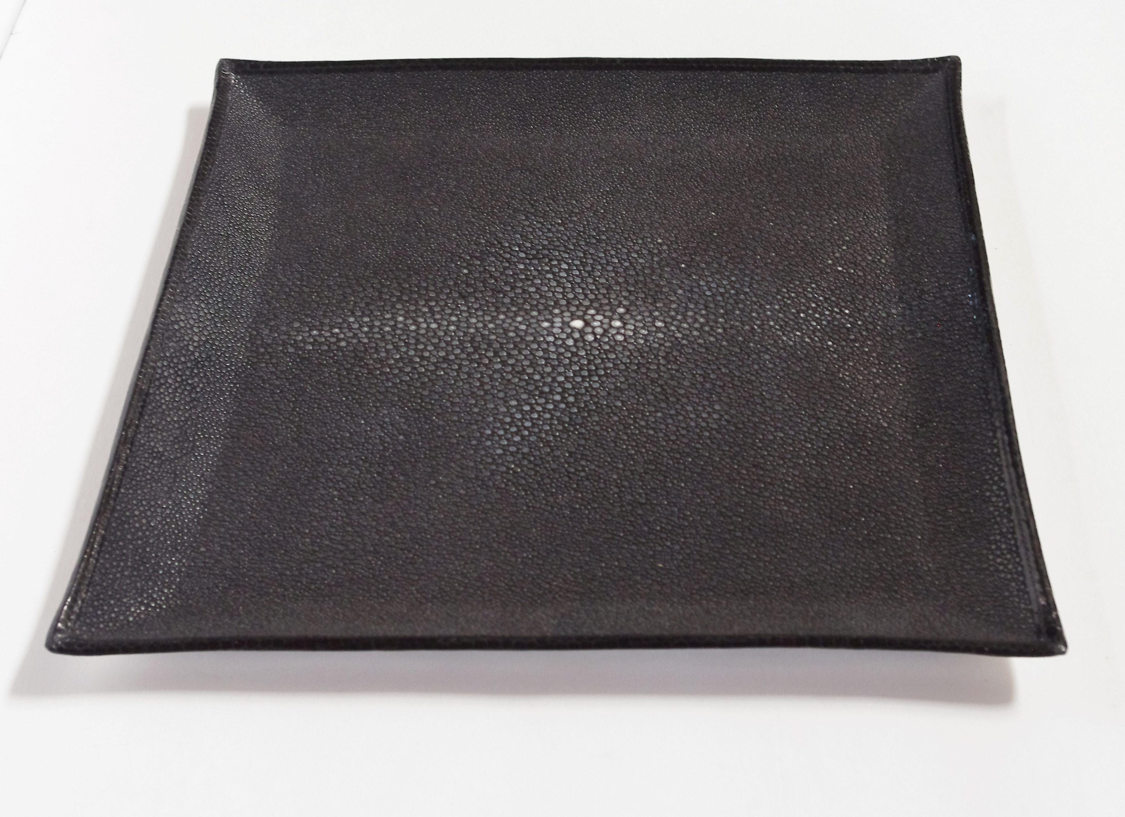 Black shagreen and hand beaten stainless steel tray with black leather presentation box
Designed by Fabio Bergomi for Fabio Ltd / Made in Italy
Measures: Depth 12.5 inches, width 12.5 inches, height 1 inch
1 in stock in Los Angeles
Order reference