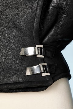 Black shearling perfecto with silver metal buckles Thierry Mugler