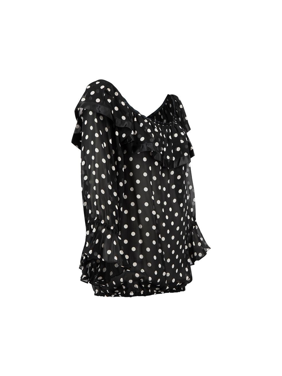 CONDITION is Very good. Minor wear to blouse is evident. Minimal wear to satin binding at shoulders on this used Dolce & Gabbana designer resale item. 



Details


Black

Silk

Long sleeves

Sheer- see through

Off the shoulder

Polkadot