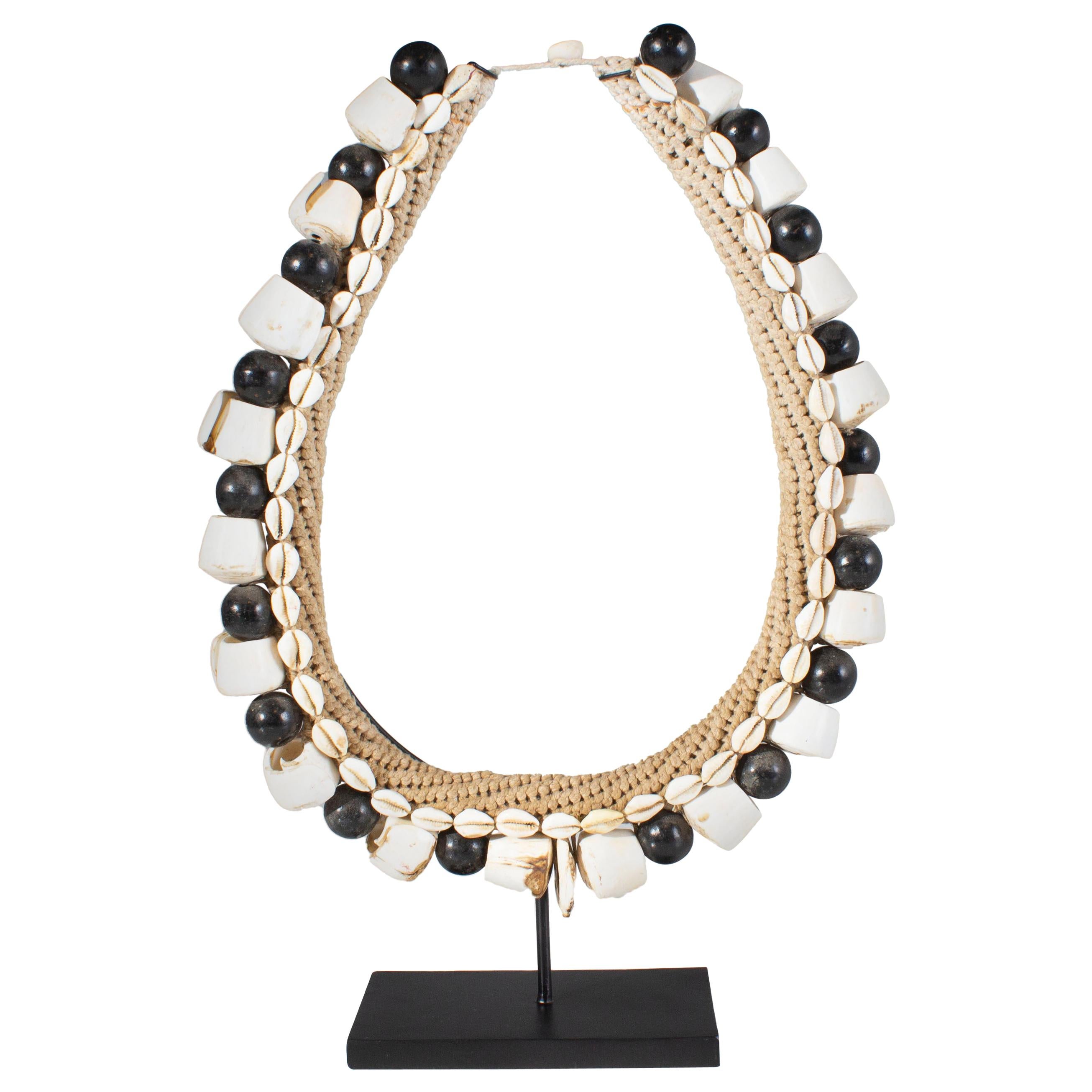 Black Shell Necklace Accessory on Stand