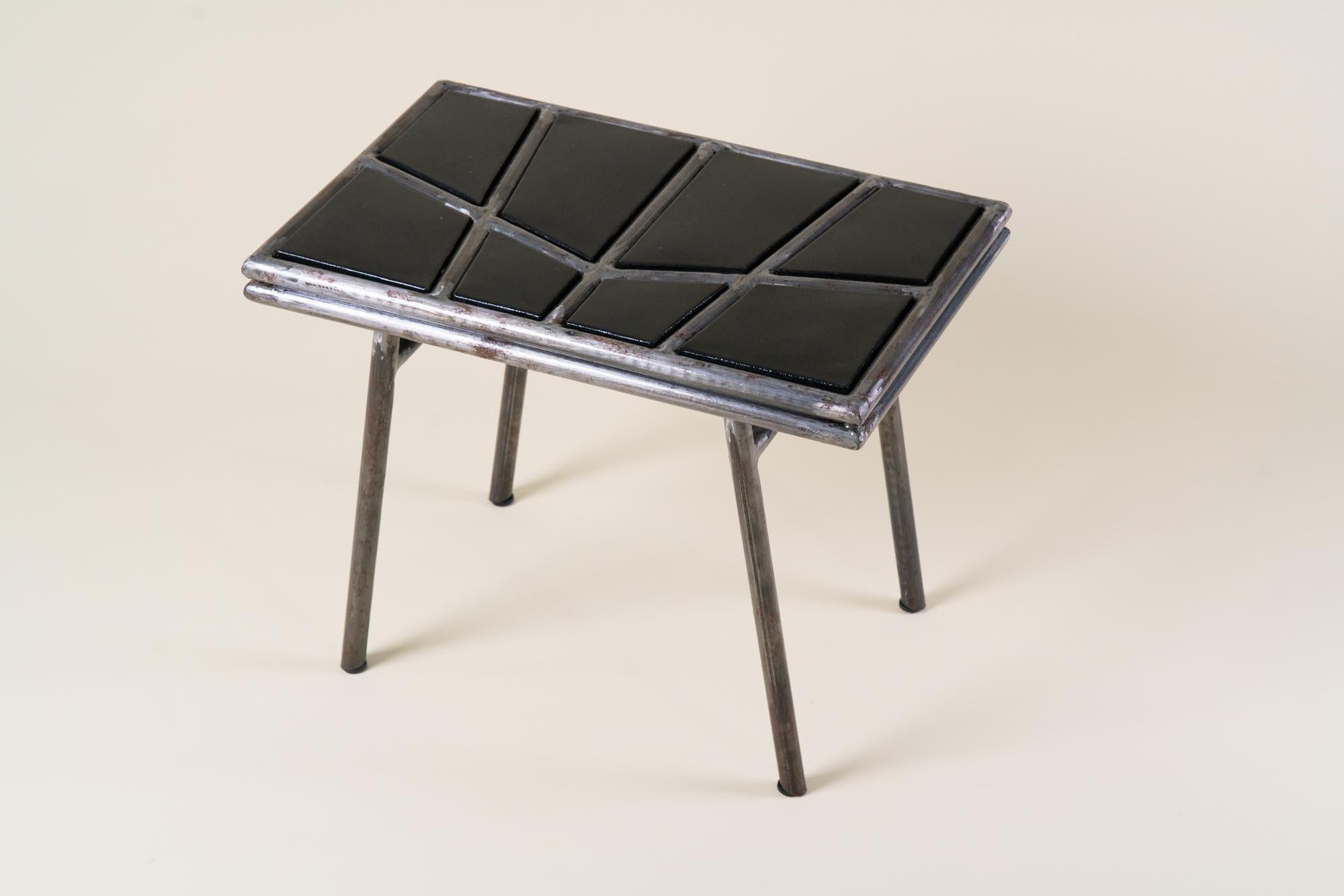 Ousmane Mbaye is a self-taught Senegalese designer born in Dakar. After working for 17 years as a refrigeration technician, he turned to furniture design, using recycled and industrial materials—especially metal—to create bold, colorful, and