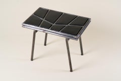 Mesa auxiliar negra de Ousmane M'Baye