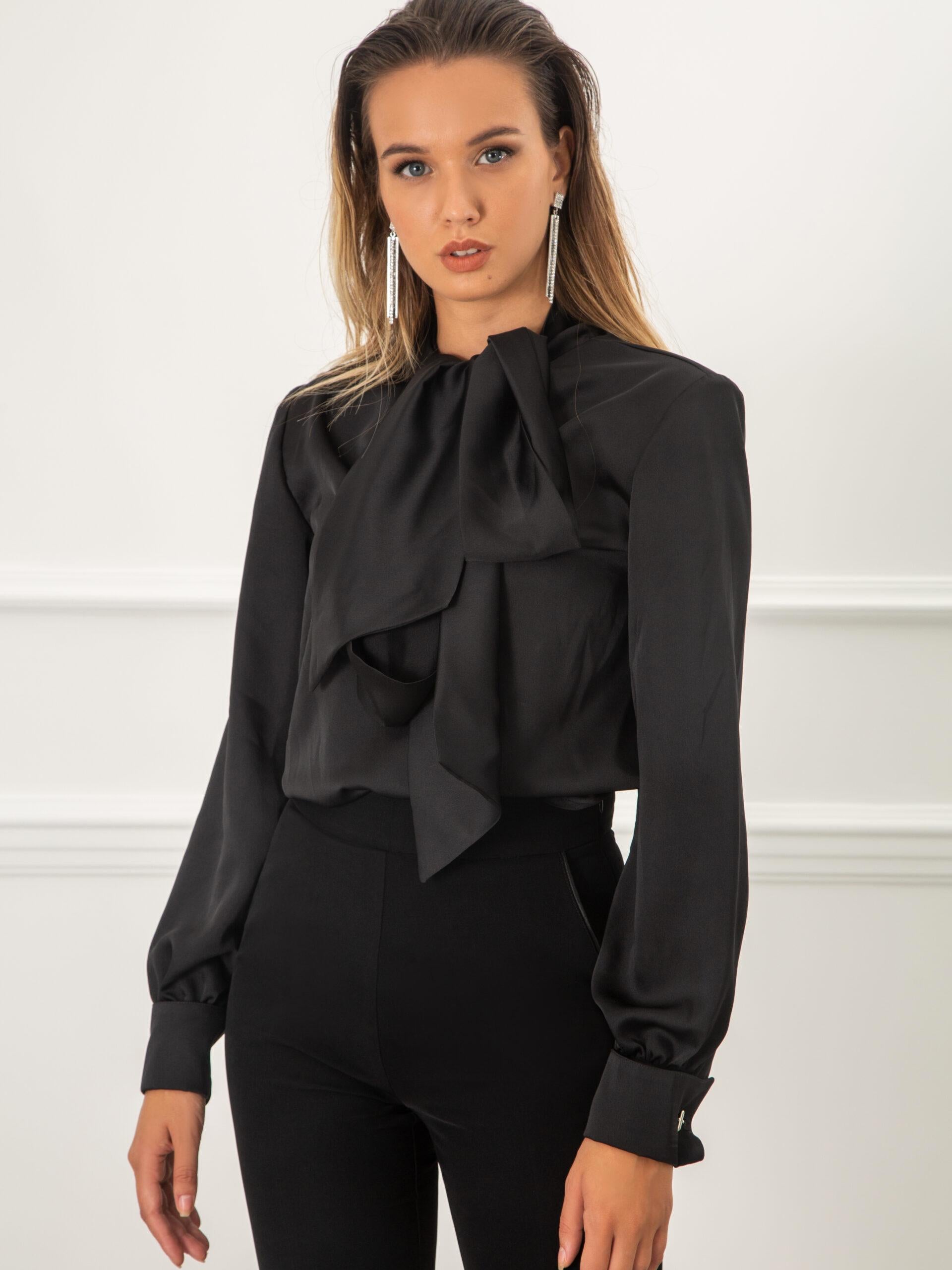 The pussy-bow neckline of the MADA blouse gives it a timeless and romantic appeal. It is crafted in Italy with the option to remove the neck tie, leaving in its place a simple rounded neckline.