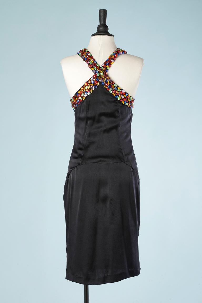 Black silk cocktail dress with colorful rhinestone. Zip on the left side. 
Size 40 (M ) 