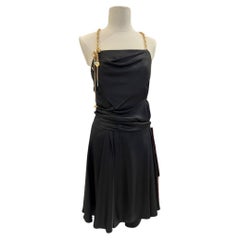 Black silk cocktail dress with gold metal chain and pendants Louis Vuitton