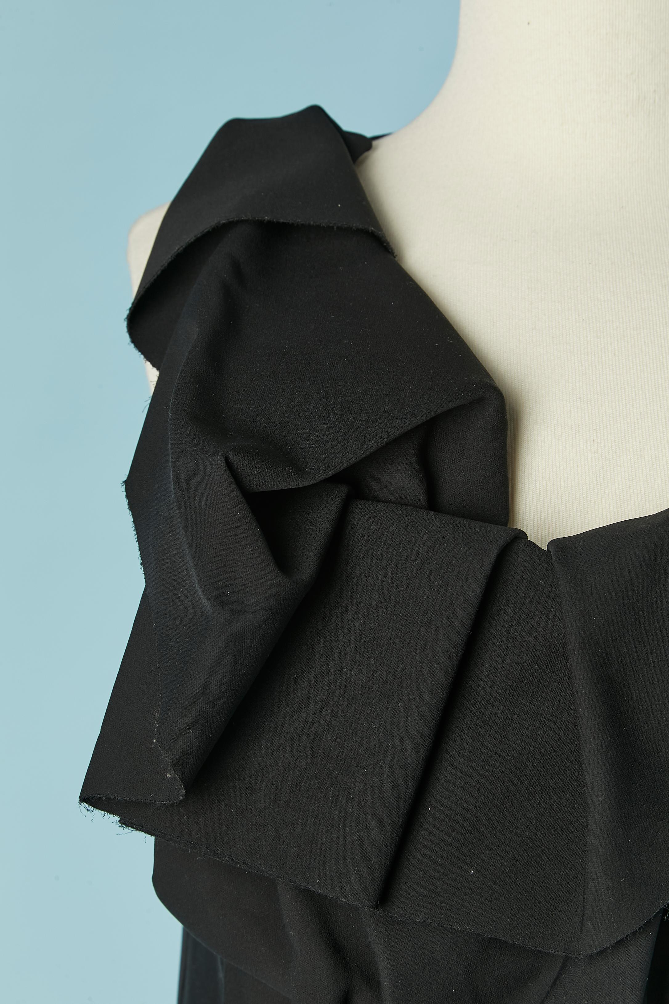 Black silk draped sleeveless dress. The fabric is a stiff and thick silk. 
Invisible zip closure on the left side. Raw cut edge. 
SIZE 44 (It) 40 (Fr) L 