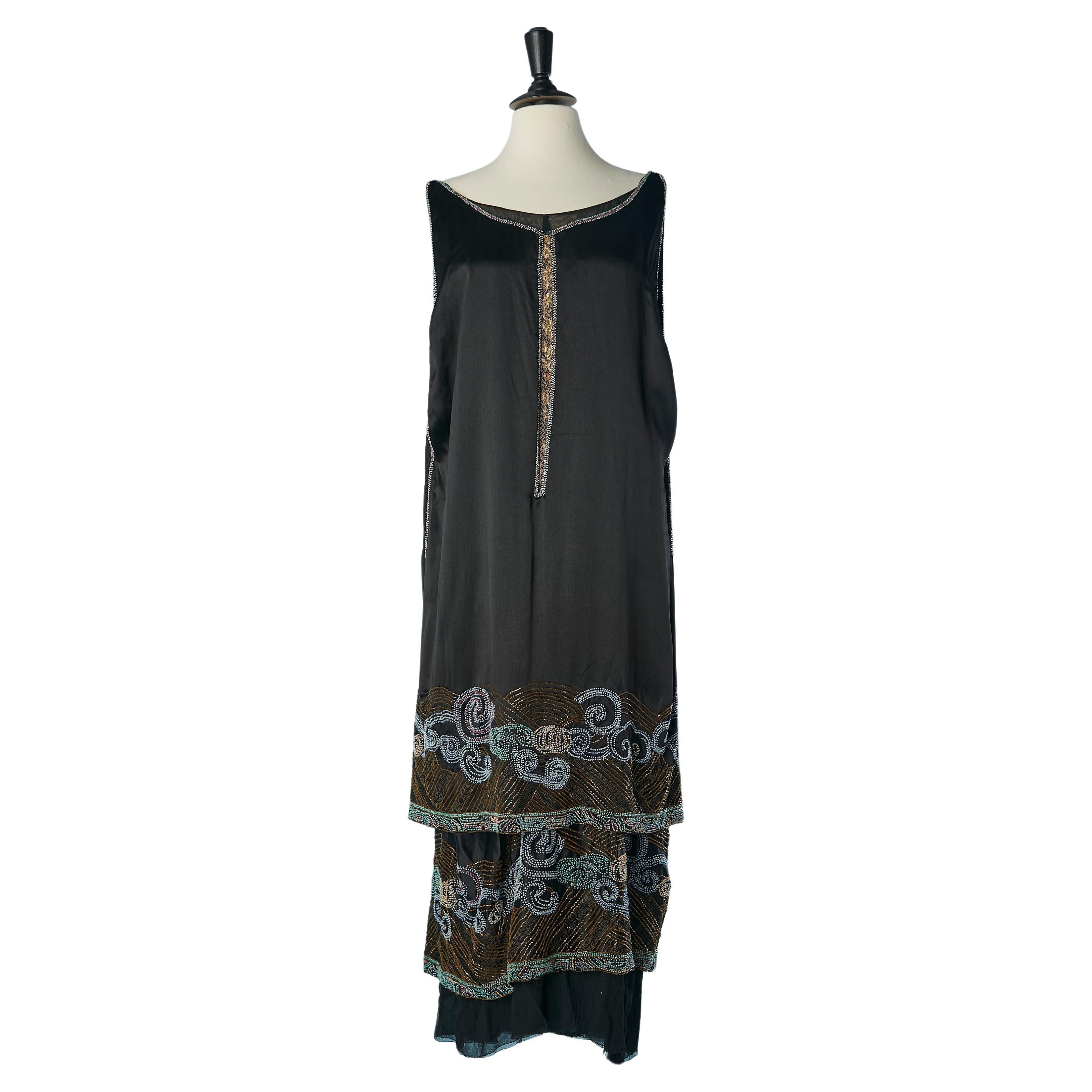 Black silk satin and silk chiffon beaded evening dress Circa 1925's 
