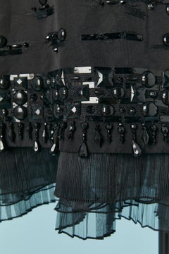 Black silk skirt with beadwork and ruffles PER SE