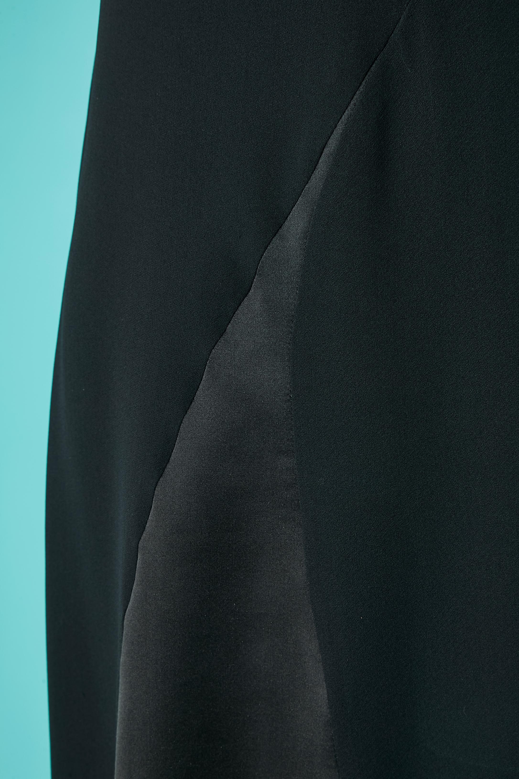 Black silk chiffon with silk inset , sleeveless cocktail dress with bow on the shoulder. Hidden zip and hook&eye in the middle back. 
SIZE 38 (Fr) / M 
Could be Lindsey Lohan collection for Ungaro 