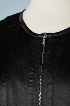 Black silk top with zip in the front and quilted top-stitched strips Chanel