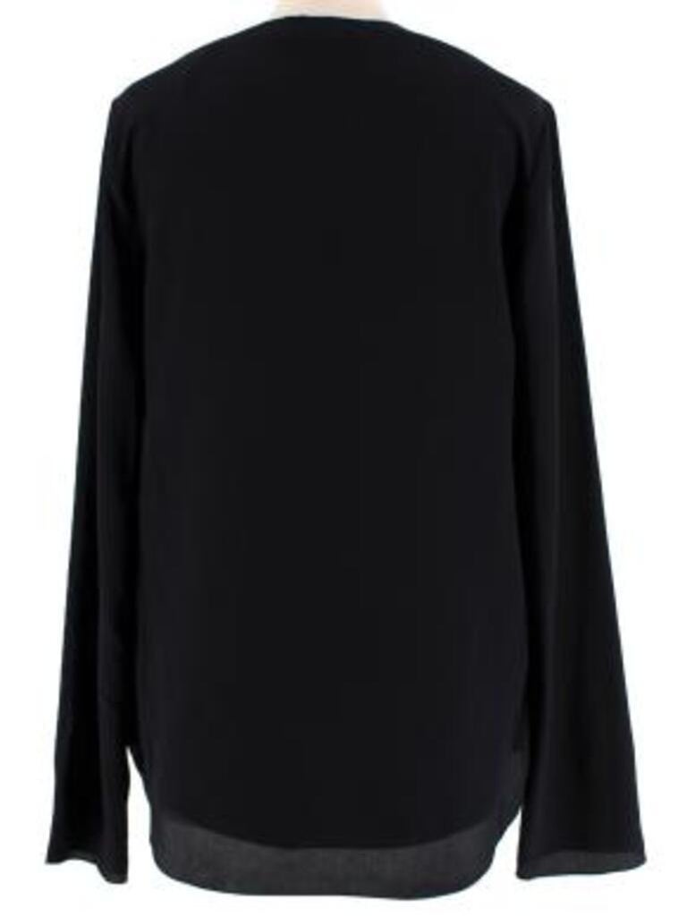Black, Short-Sleeved Blouse With A V-Neck And A Textured, Vertical Pattern main image 1