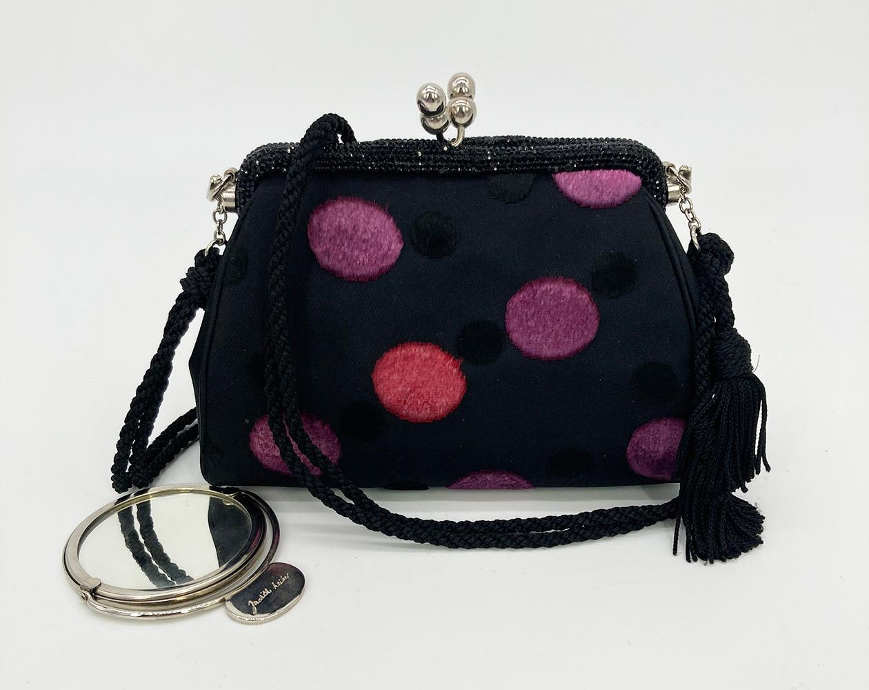 Judith Leiber Black Silk Velvet Polka Dot Crystal Top Clutch in excellent condition. Black silk with purple pink and black velvet polka dot pattern trimmed with silver hardware and black swarovski crystals. Top kiss lock closure opens to a black