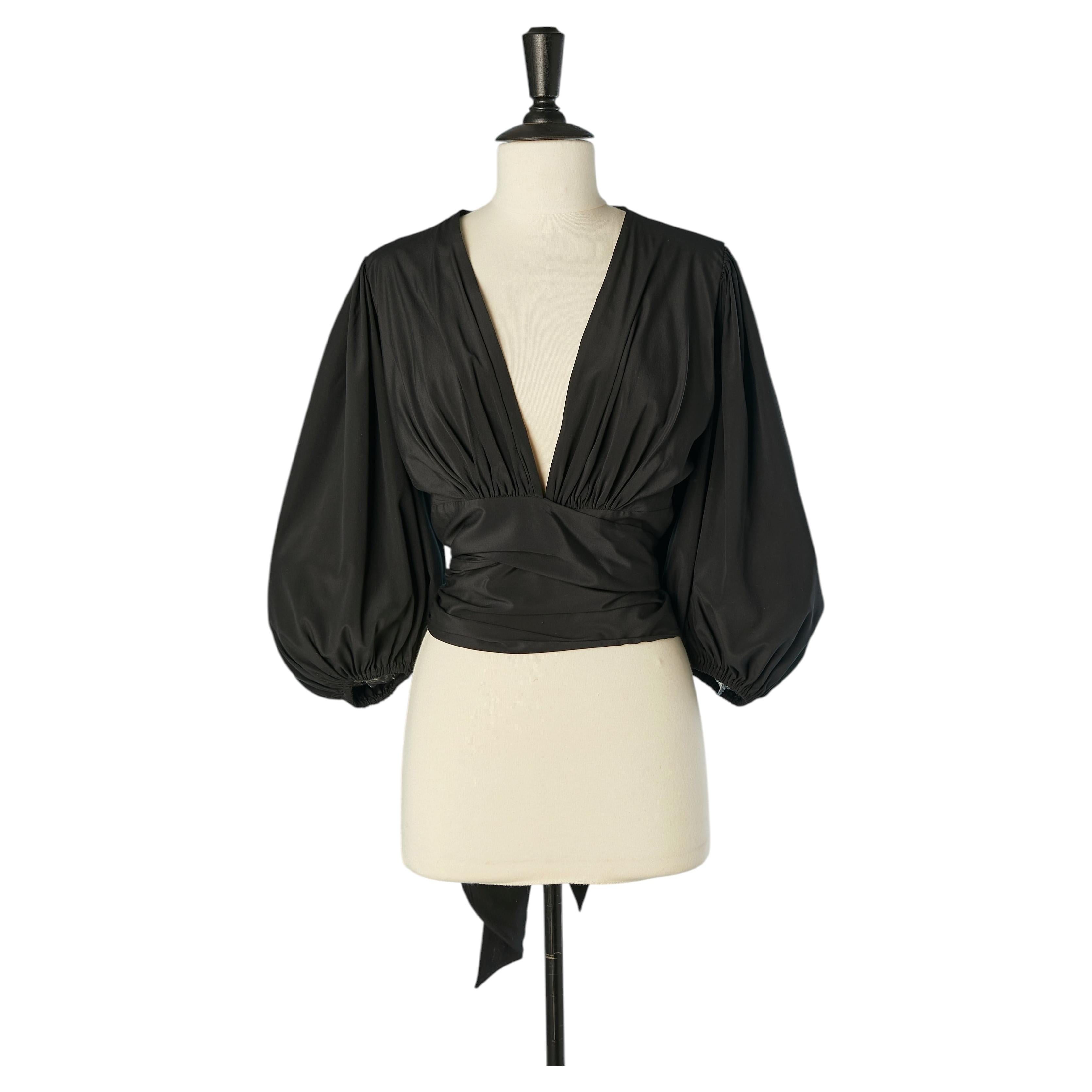 Top de seda negro con mangas abullonadas de ALEXANDRE VAUTHIER