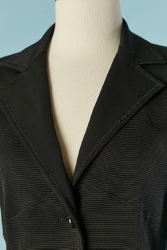 Black skirt-suit with cut-work and top-stitching Dolce & Gabbana
