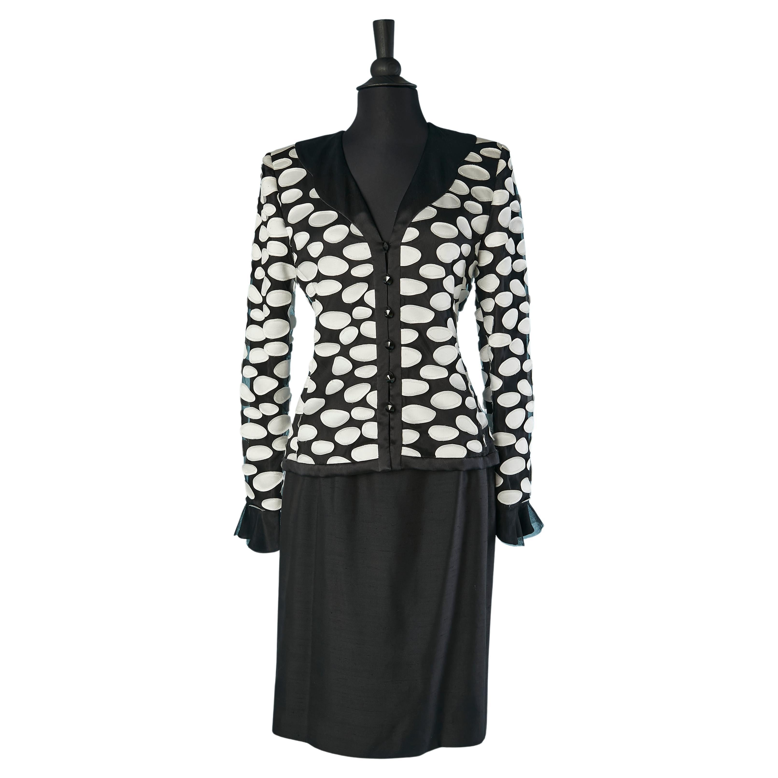Black skirt-suit with white silk appliqué on the jacket André Laug Circa 1980's For Sale