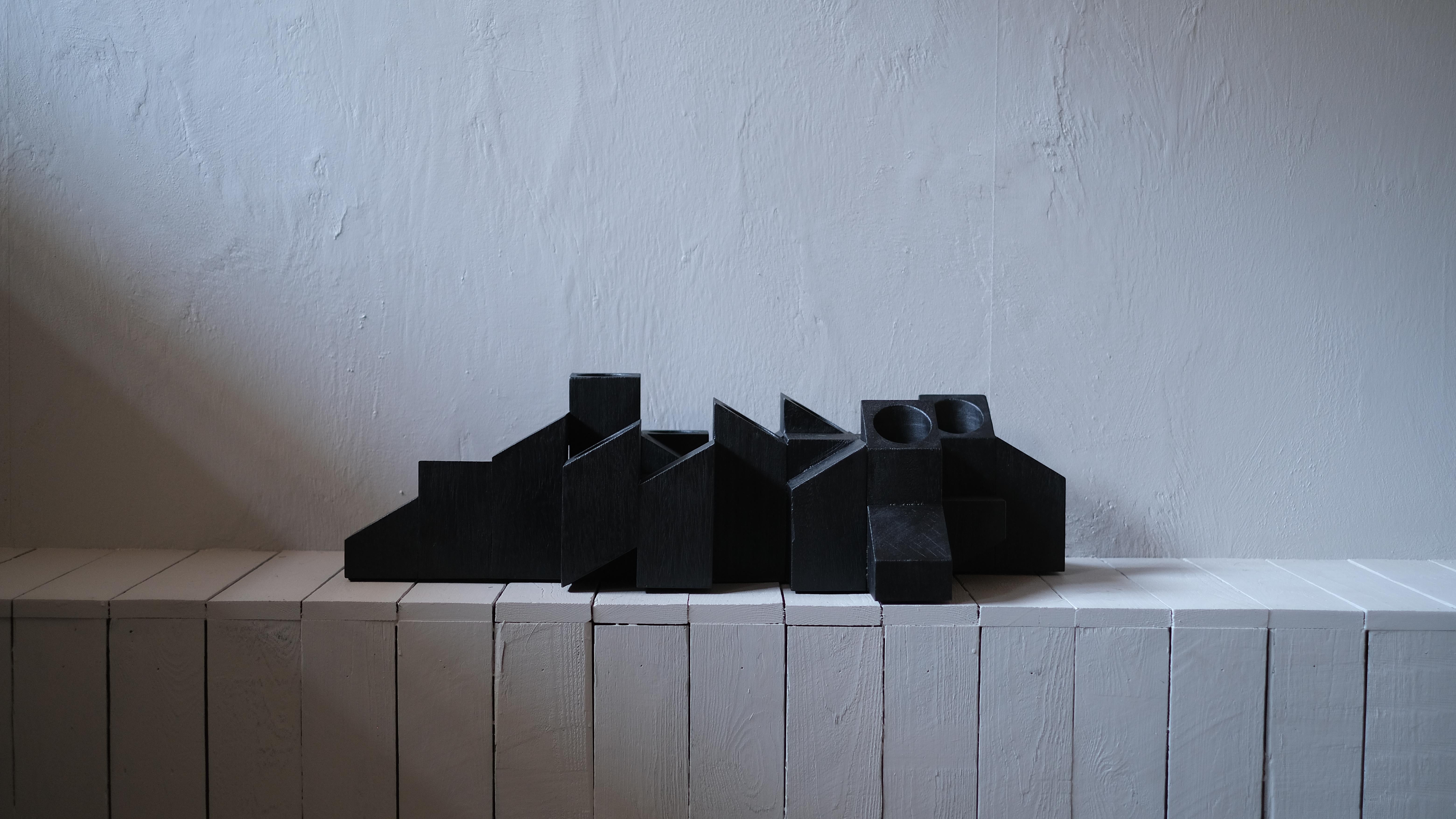 Black skyline candle light in iroko wood by Arno Declercq
Dimensions: D 40 x W 80 x H 20 cm
Materials: Burned and oiled African walnut

Arno Declercq
Belgian designer and art dealer who makes bespoke objects with passion for design, atmosphere,