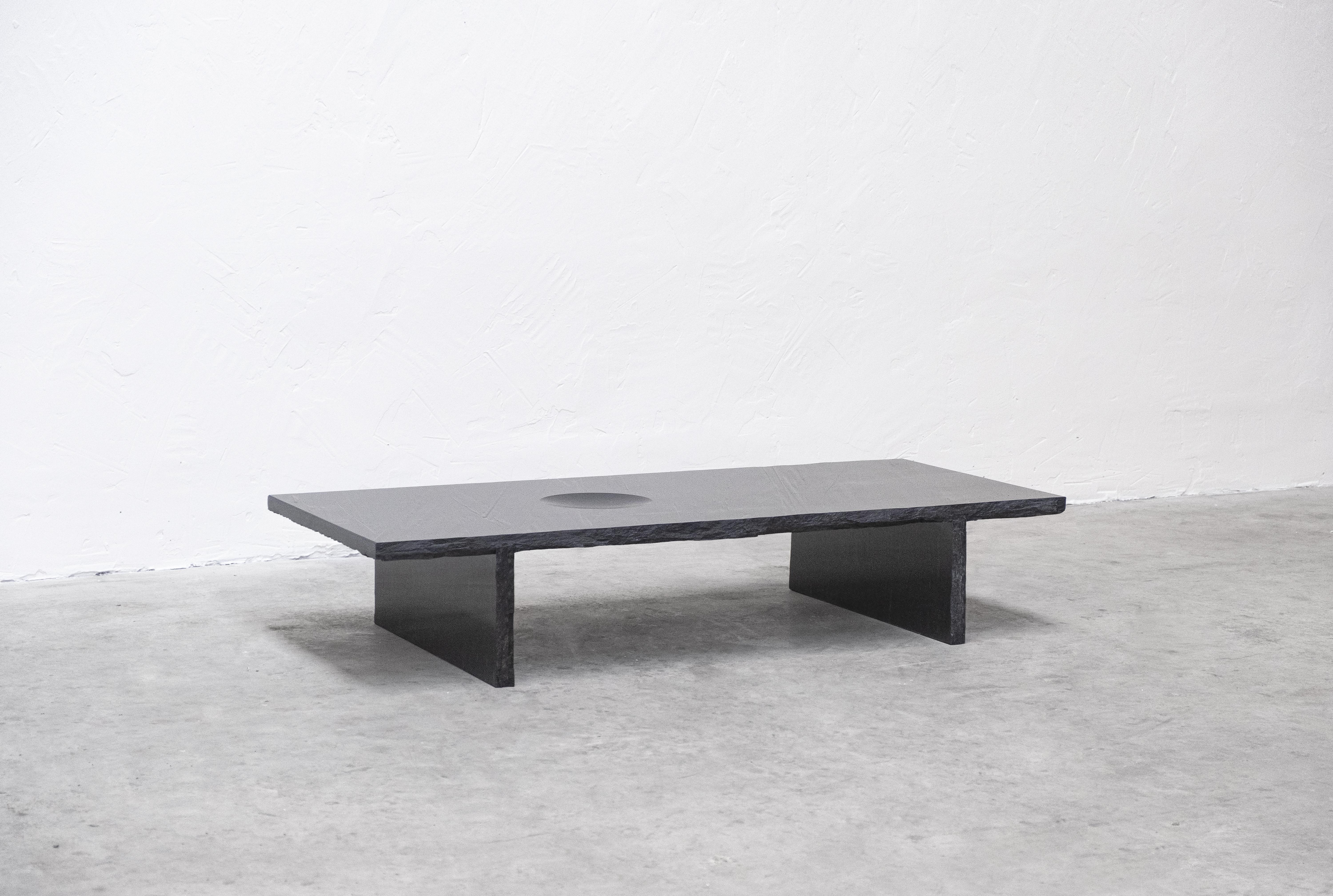Black slate sculpted low table by Frederic Saulou
Frustre II
Black slate 
Measures: L 160 x W 70 x H 30 cm, approximately 150 kg
Limited edition of 12
Signed and numbered.

