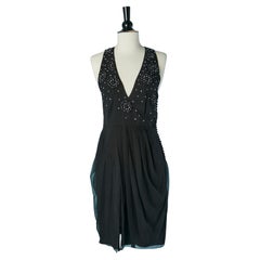Black sleeveless cocktail dress with rhinestone embellishment CHRISTIAN DIOR Black sleeveless cocktail dress with rhinestone embellishment CHRISTIAN DIOR