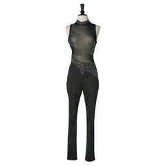 Black sleeveless jumpsuit in stretch tulle, lycra and rhinestone