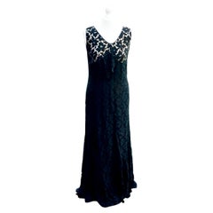 Antique Black Sleeveless Lace Dress in a Flower Design with Front Ruffle circa 1930s
