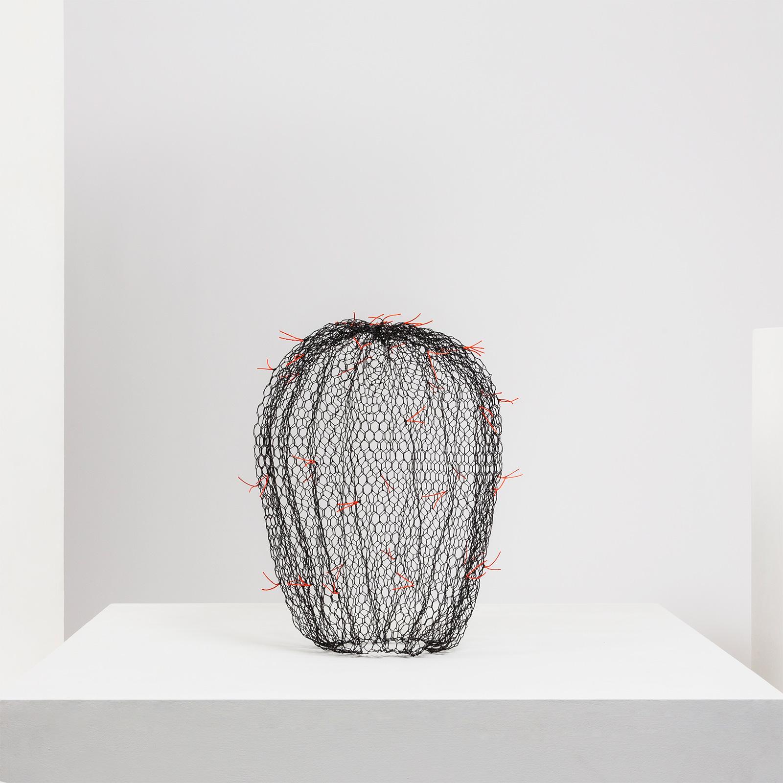 Benedetta works in many materials but is most well known for her innovative and extraordinarily wire work. Each piece starts life as flat rolled chicken wire which is gradually shaped by hand, twisting and joining the pieces together to give a