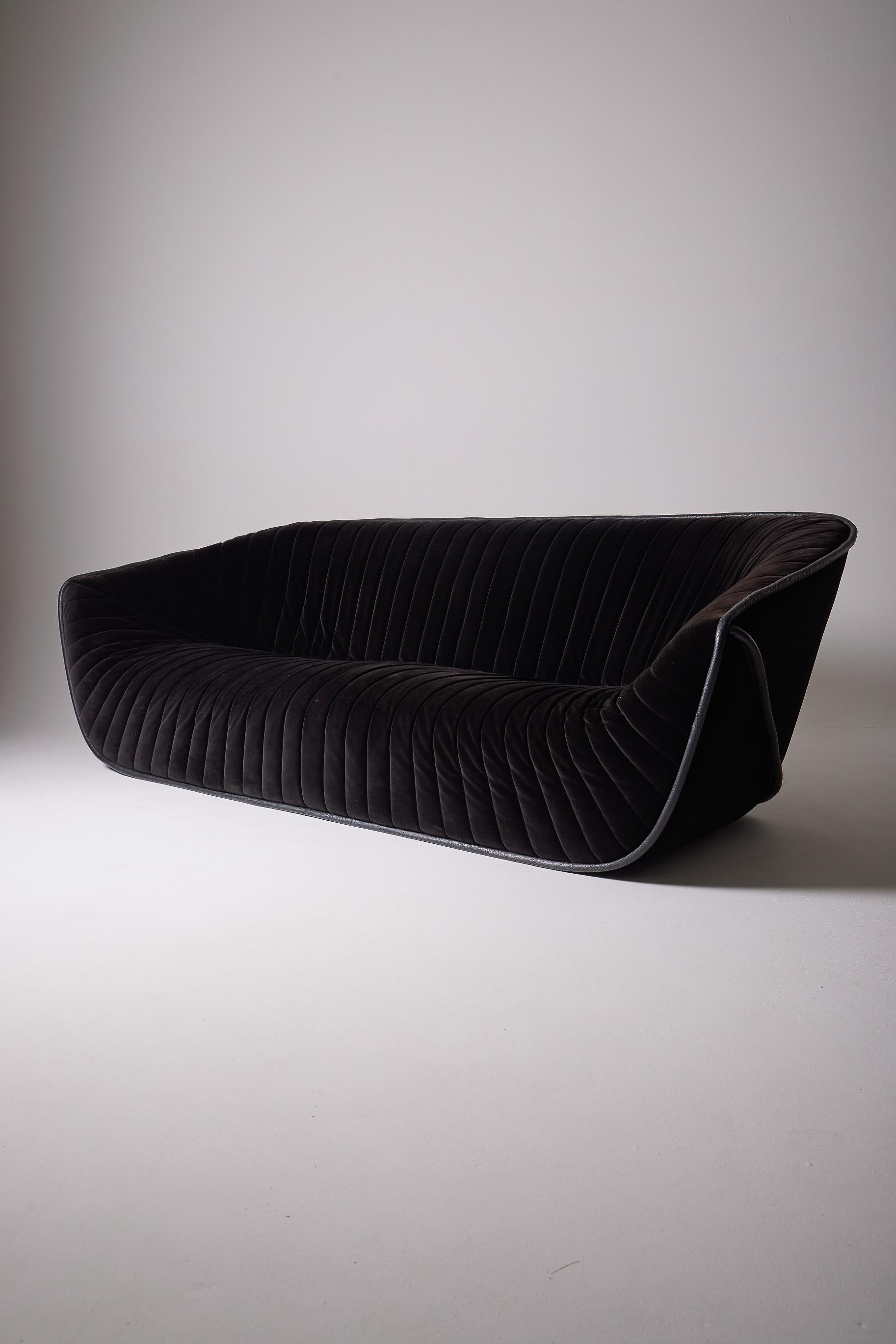 Black pleated velvet sofa, 