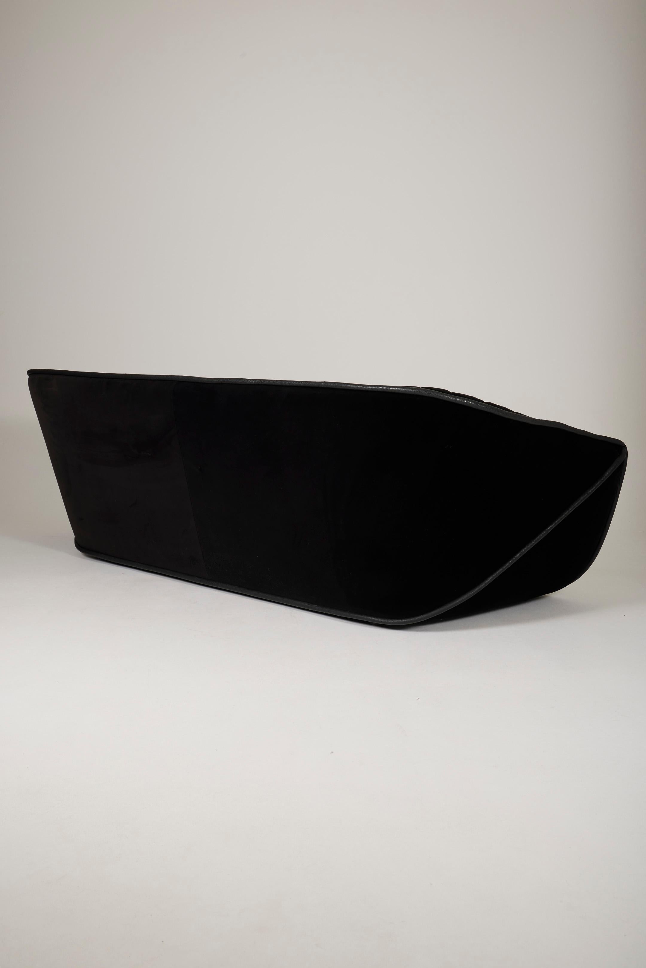 Black sofa by Cédric Ragot 2