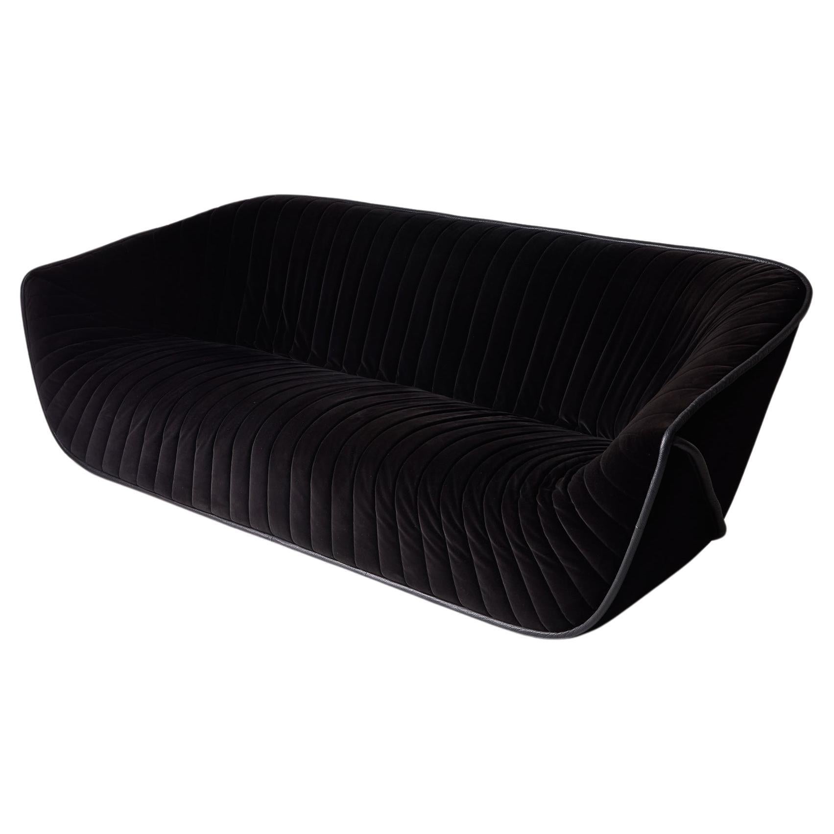  Black sofa by Cédric Ragot