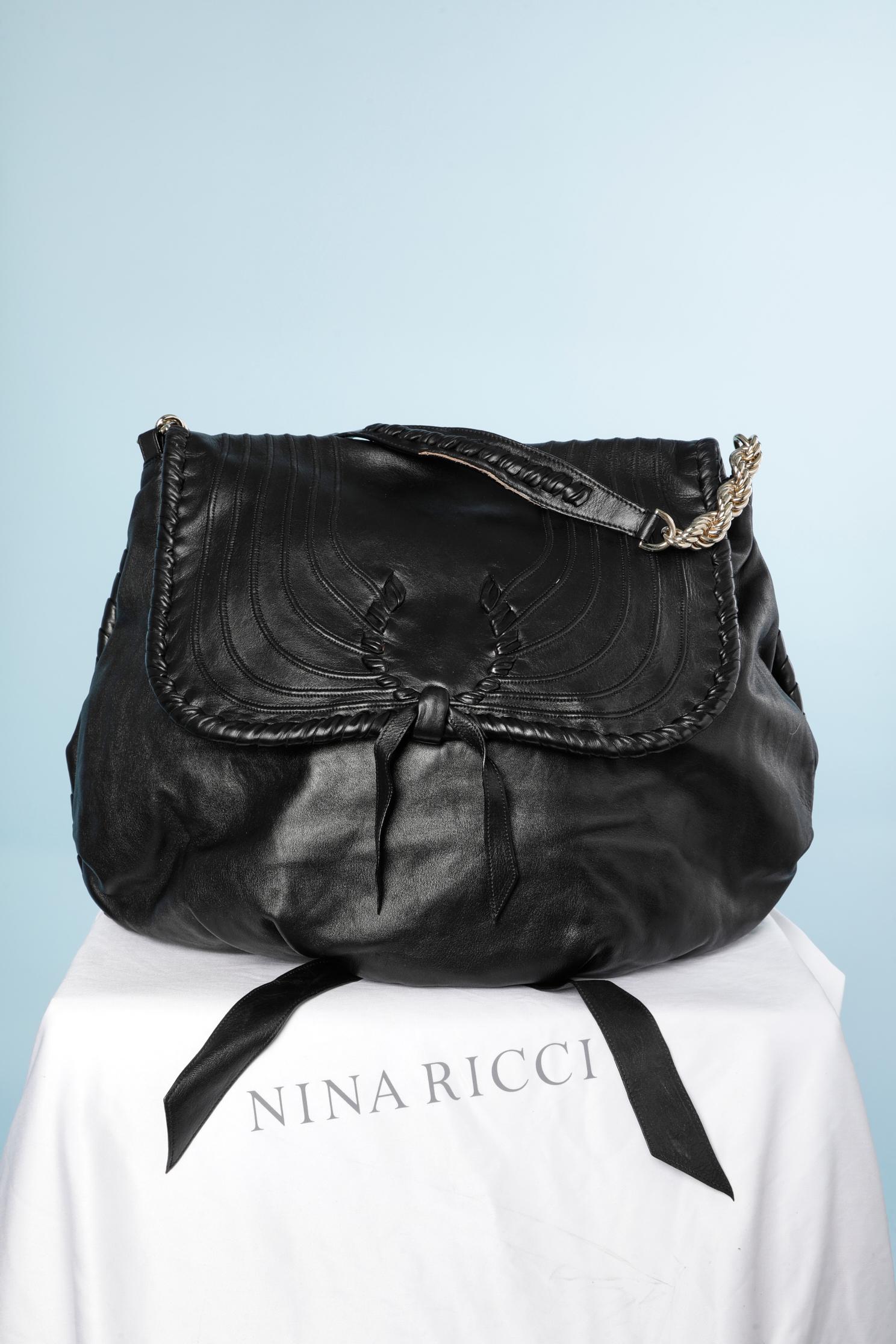 Black soft leather shoulder bag with topstitching.
Size: 55 cm X 45 cm 
Strap length: 50 cm 
Dust-bag provided 