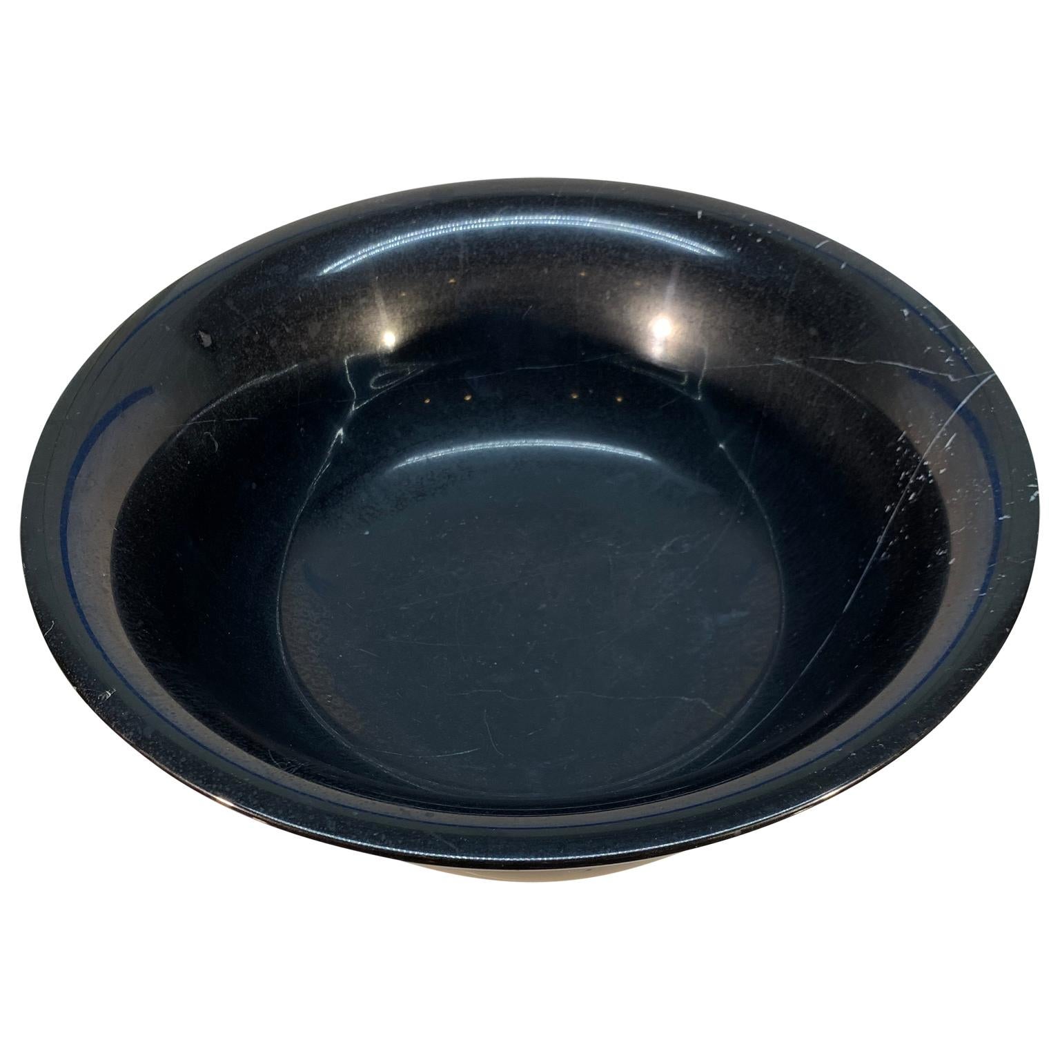 Black solid marble bowl centerpiece.