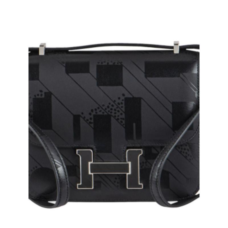 Hermes Black Sombrero On a Summer Night Constance 18 PWH
 
 Age - A 2017
 
 A Limited Edition Hermès Constance 18cm A Summer Night handbag. The exterior of this bag features subtle black printing on black Sombrero leather with tonal stitching,