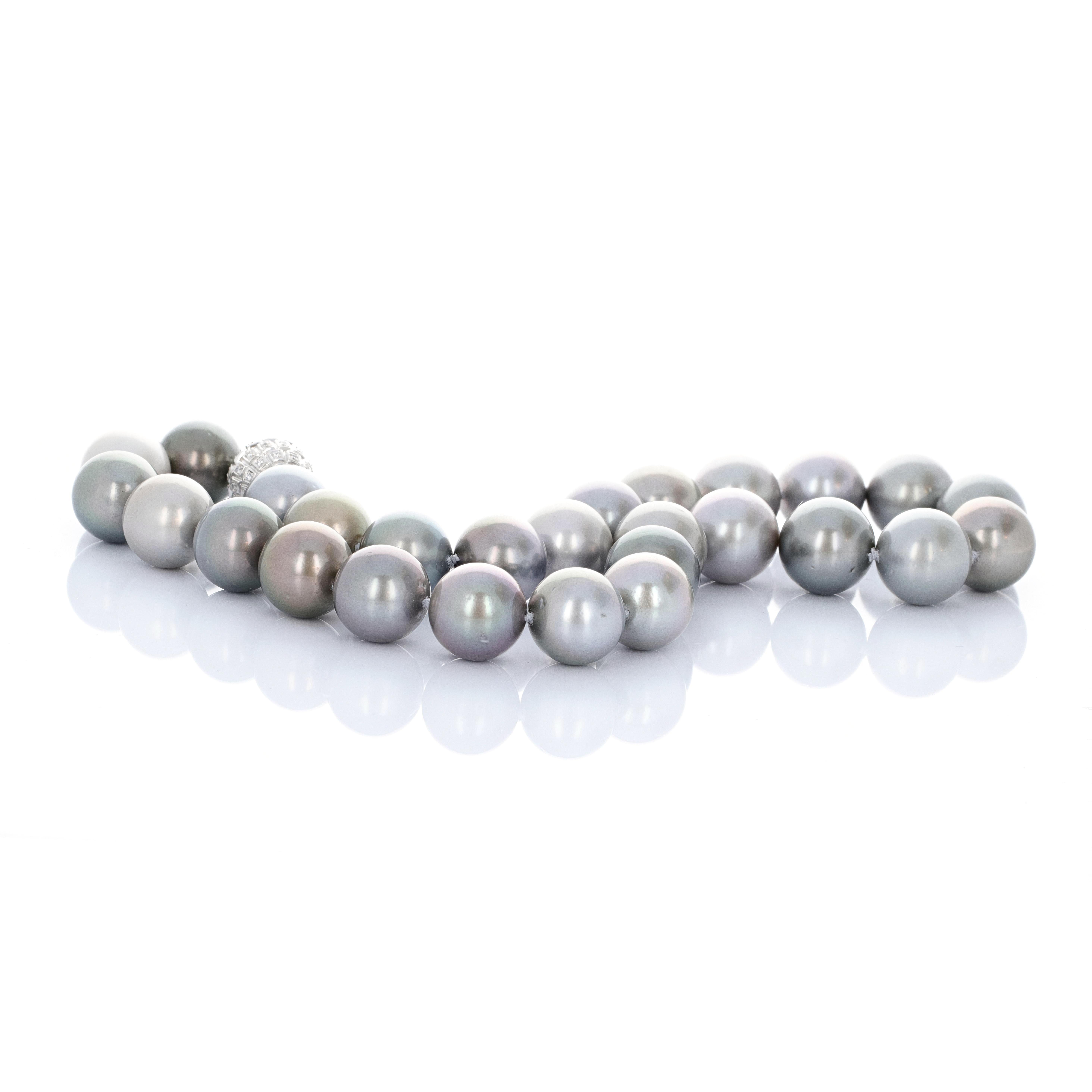 A classic black South Sea Tahitian pearl necklace with a diamond clasp. The necklace is made up of 27 pearls graduating in size from 15mm- 16.1 mm. There is a beautiful diamond clasp which adds some sparkle to the necklace. The diamond clasp has