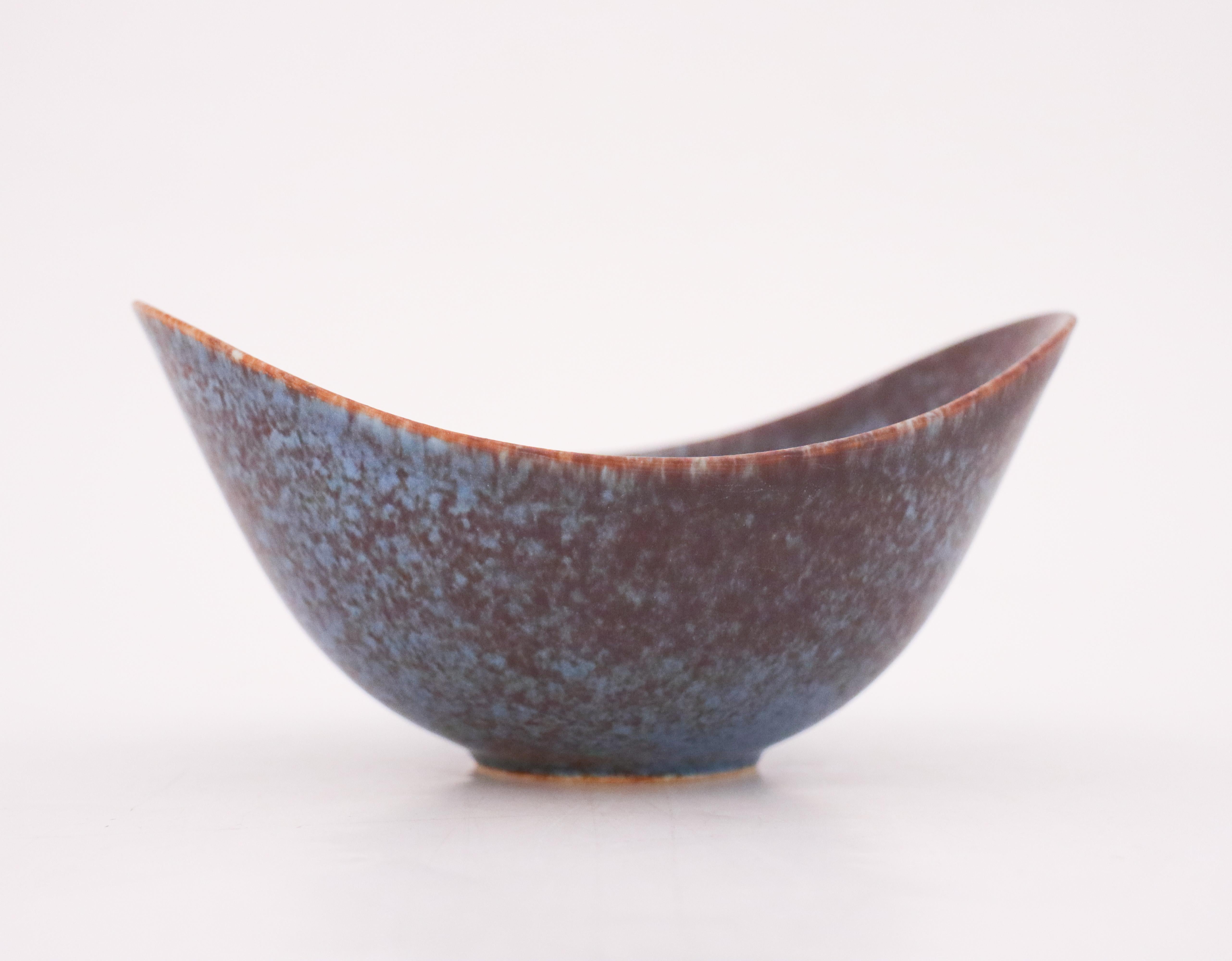 A brown & blue bowl designed by Gunnar Nylund at Rörstrand, the bowl is 16 x 12.5 cm (6.4
