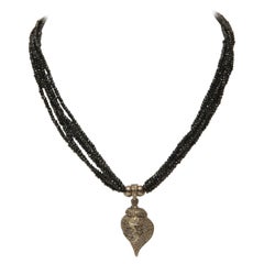 Retro Black Spinel with Diamond Conch Shell Pendant with Buddhist Om