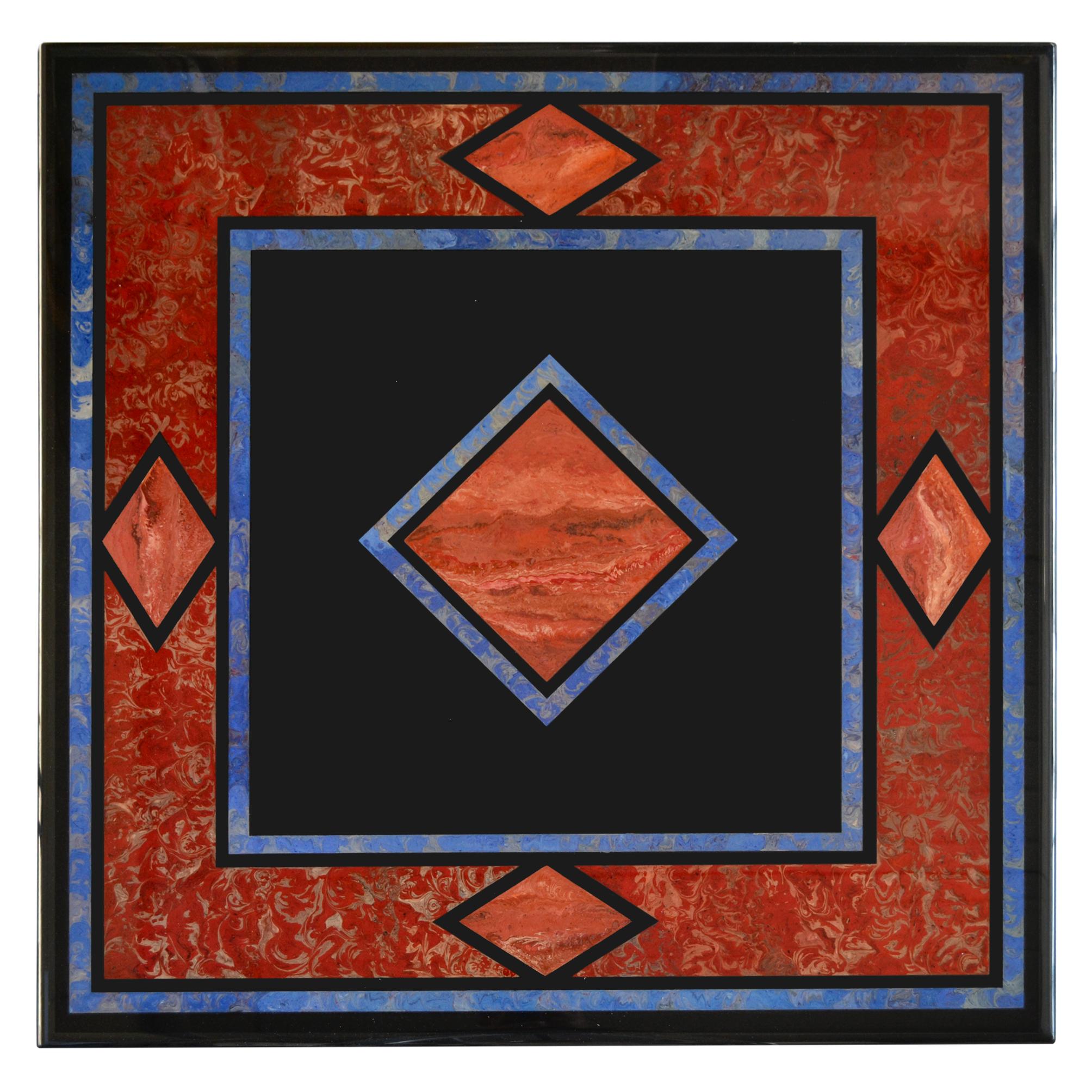 Table basse fabriquée en ardoise noire et incrustée selon la technique artistique Scagliola. 
Design géométrique bleu vif et rouge sur ardoise carrée cm. 100 x 100 posé sur 4 pieds H. 36 cm au total toute la table est recouverte d'un revêtement
