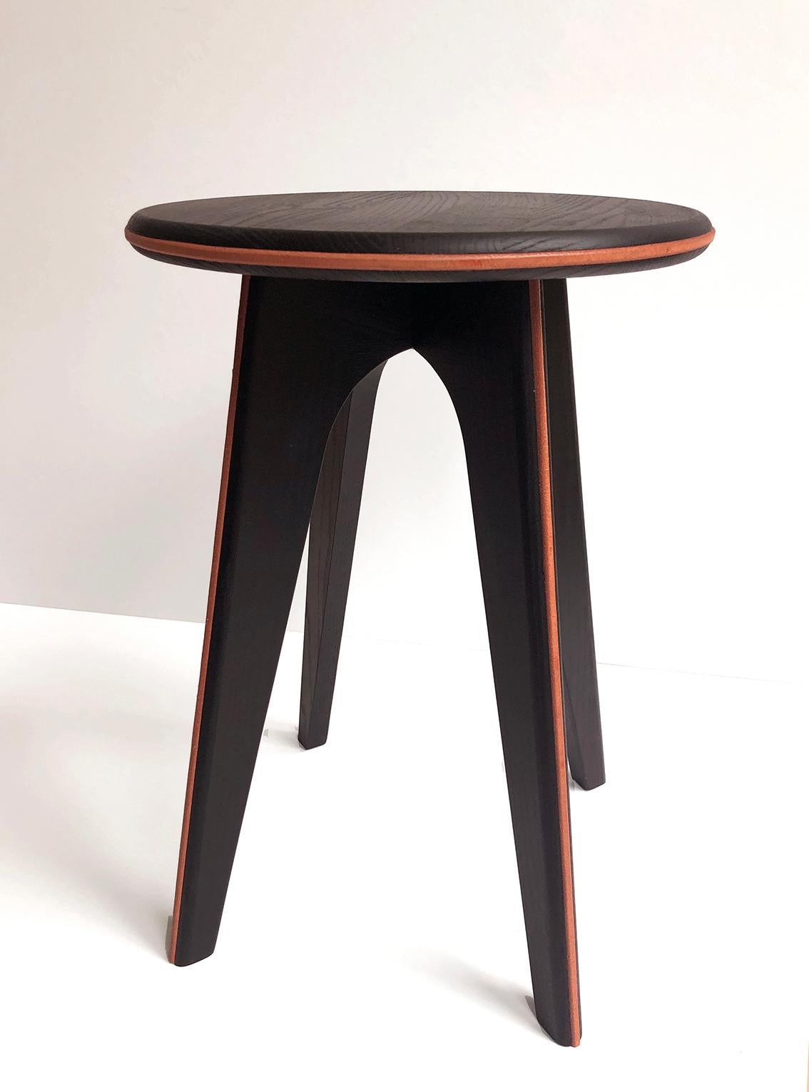 Black Stained Ash and Orange Leather Stool by Mademoiselle Jo
Dimensions: Ø 35 x H 43 cm.
Materials: Black stained ash and orange leather.

Available in two wood colors and several designs.  Please contact us.

At the border between design and